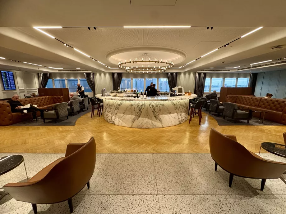 Upper floor lounge with bar