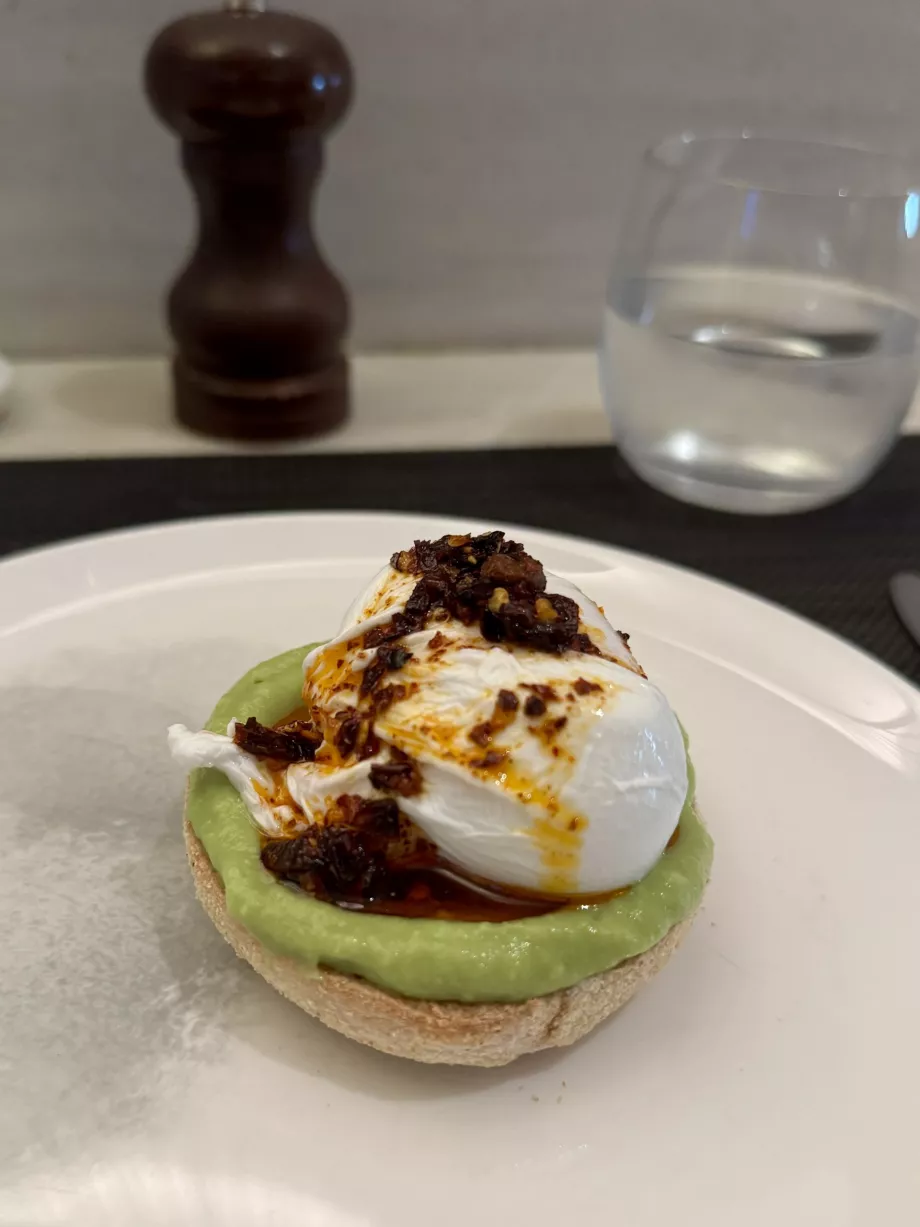 Avocado toast with egg and chilli