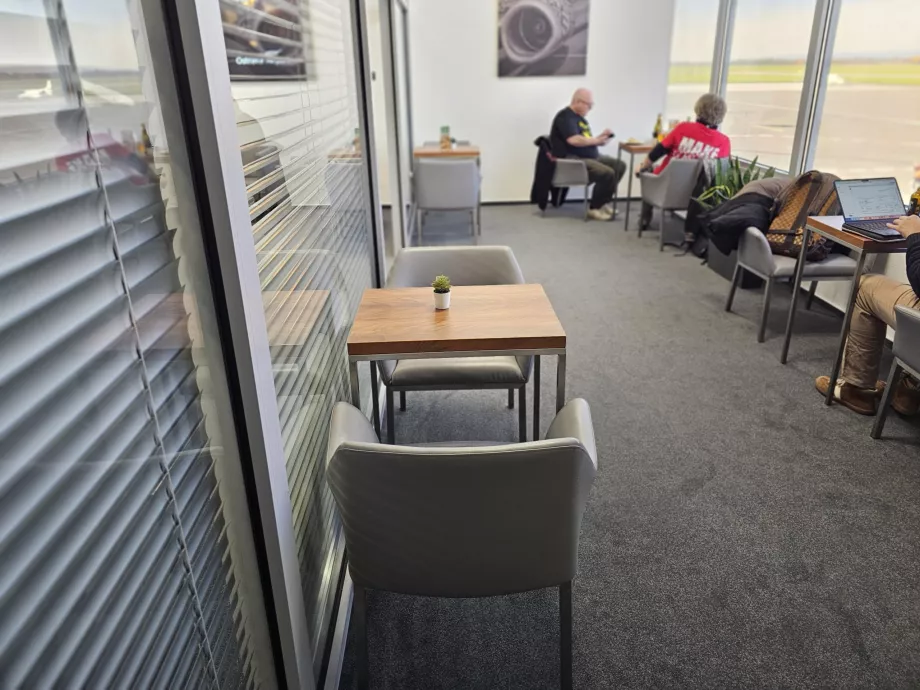 Dining tables overlooking the airport apron