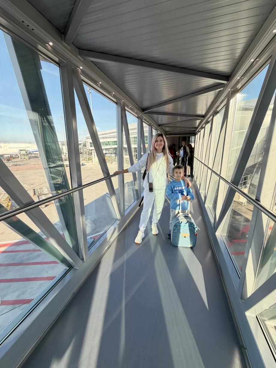 Woman with elderly son in the bridge