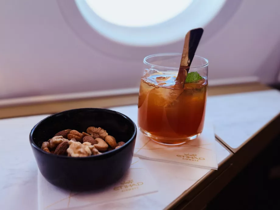 Warmed nut mixture and iced tea