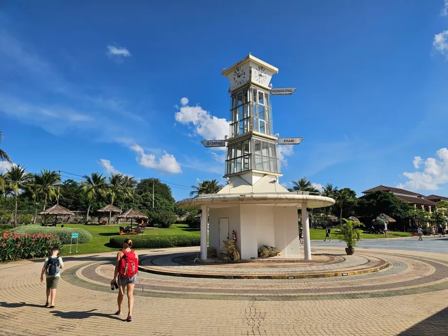 Lighthouse and signpost in front of the terminal