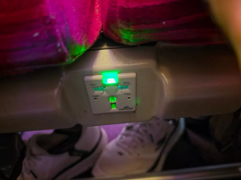 Universal socket under the seat