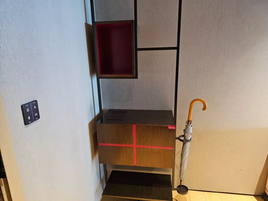 Storage compartments and umbrella