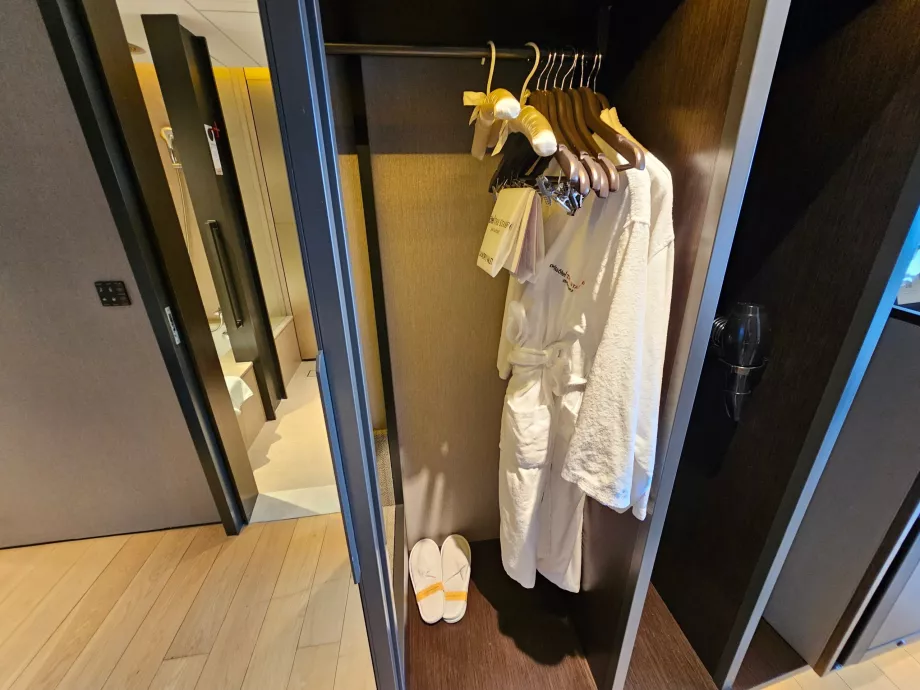 Bathrobes, slippers and hairdryer