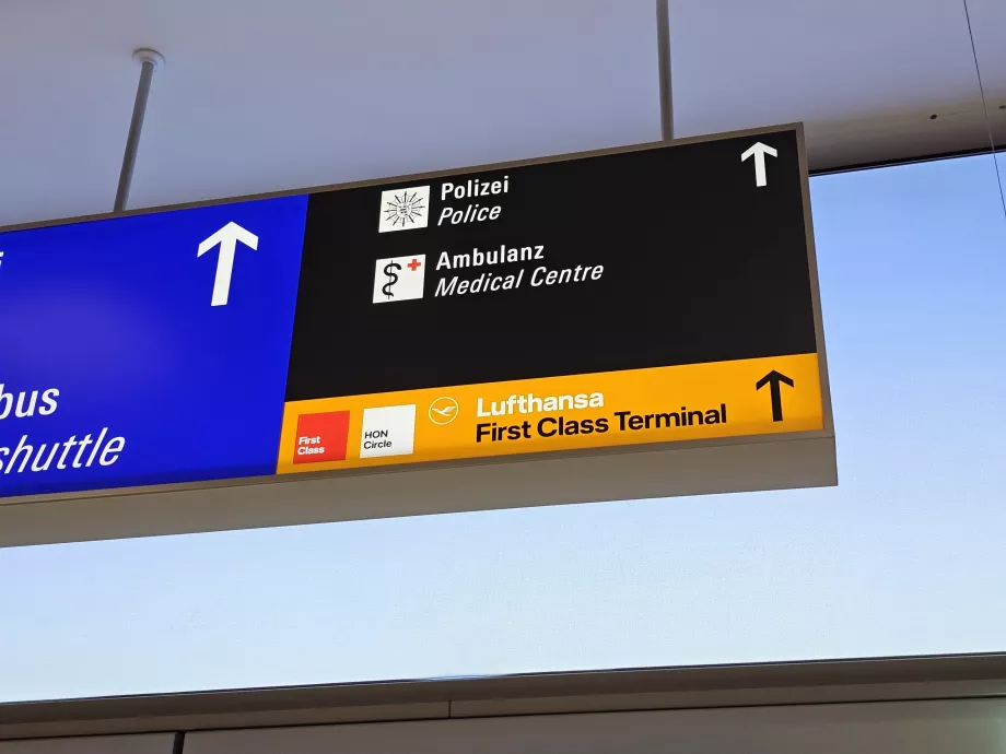 Signs towards First Class Terminal