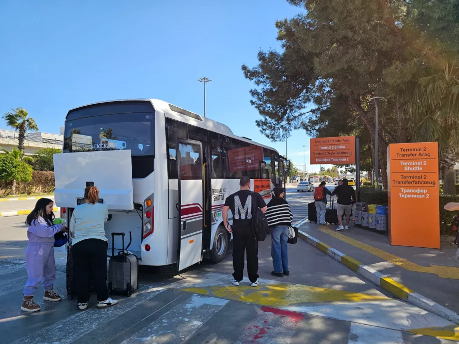 Shuttle bus stop between terminals in front of Terminal 1