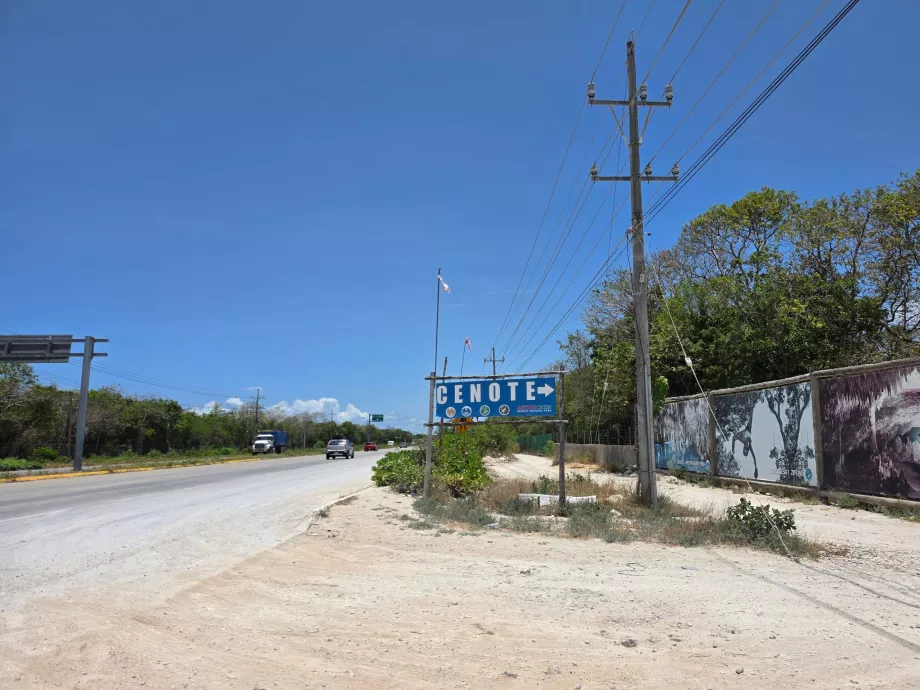 The motorway exit to the Aktun Chen cenote