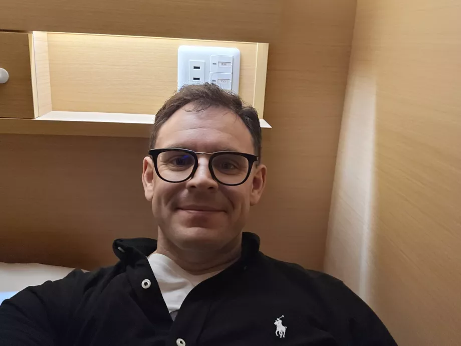 Me lying in a capsule