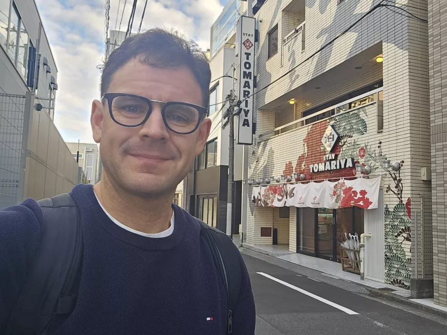 Me in front of the Tomariya Hotel