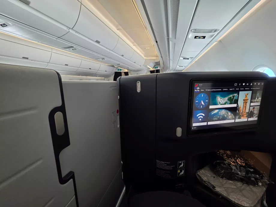 The closed door between my seat and the aisle