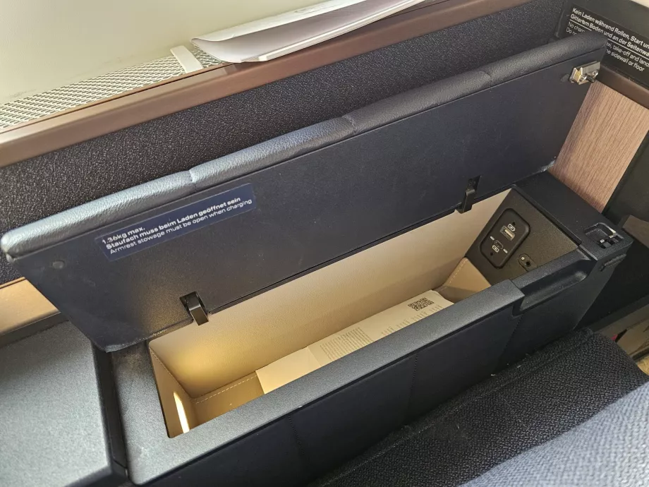Storage space in the armrest