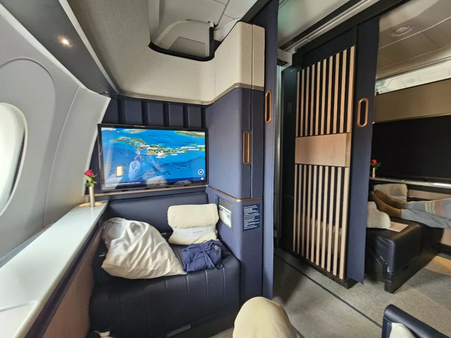 View of the alley and adjacent double Suite 1D/1E - open door