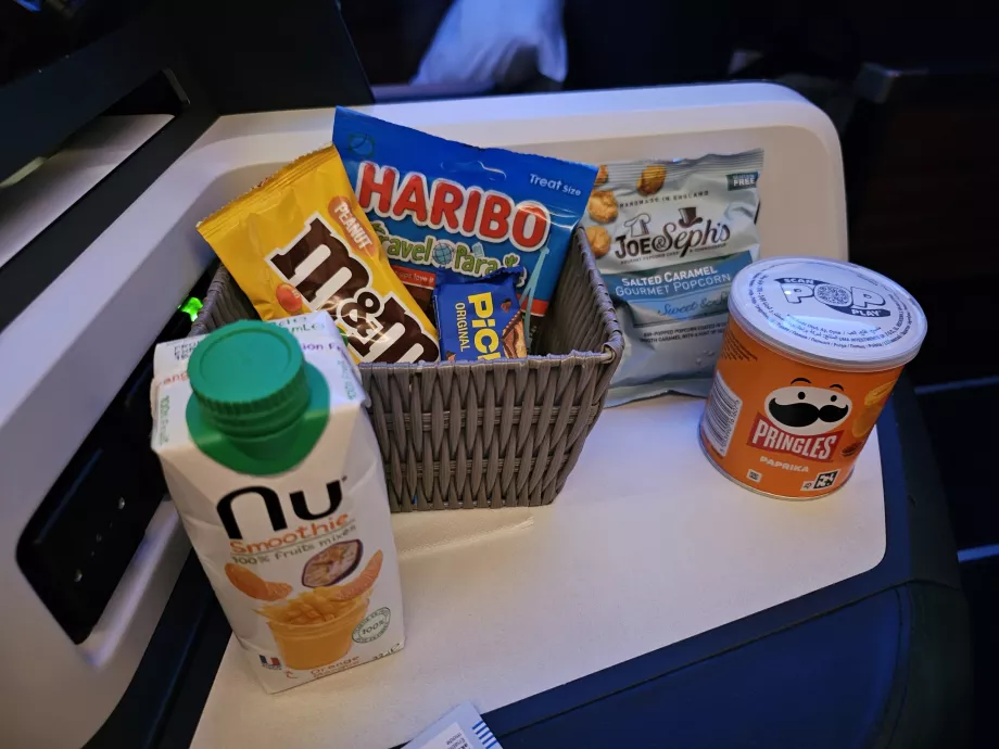 Basket with sweets and pringles
