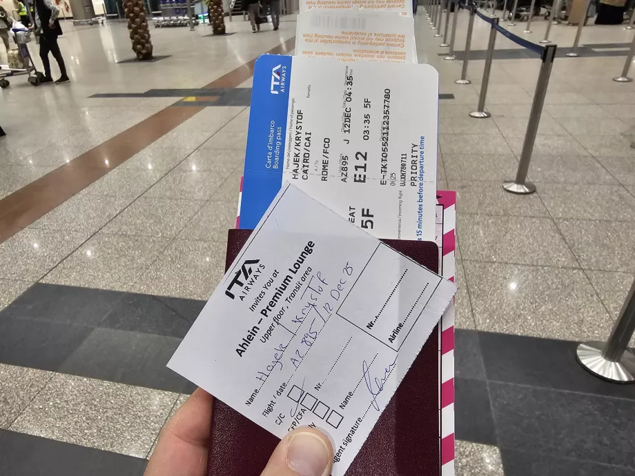 Boarding pass and lounge invitation at Cairo Airport