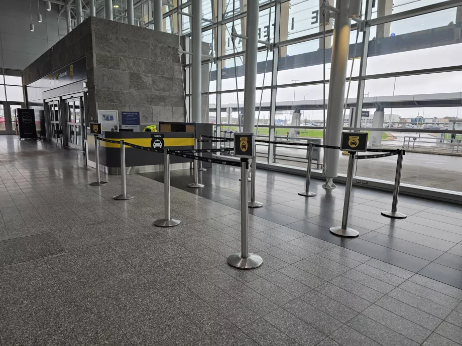Taxi stand inside the arrivals hall