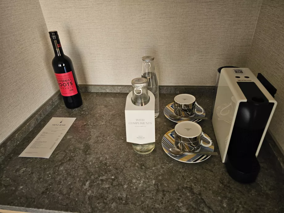 Free water and coffee, wine included in minibar