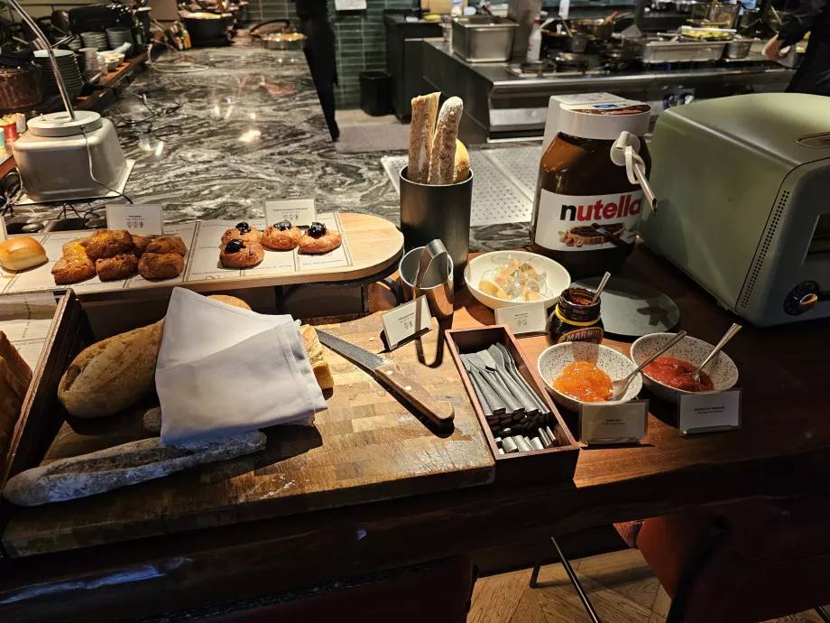 Breakfast - sweet pastries, marmalades and nutella