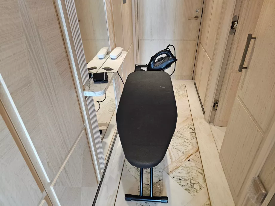 Ironing board in the room