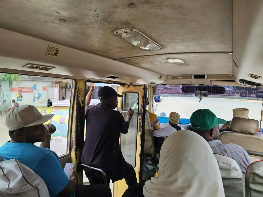 The conductor on the bus gave