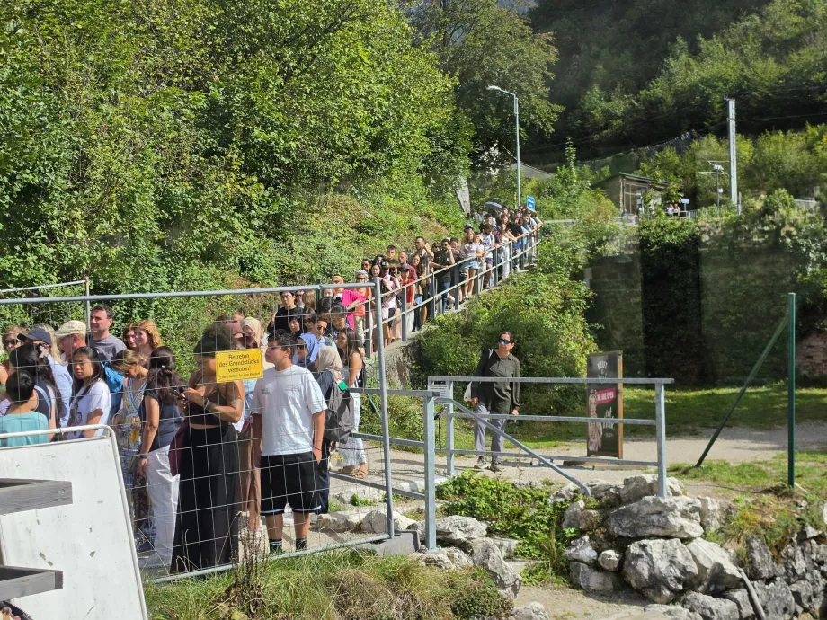 A long queue for the ferry at the railway station