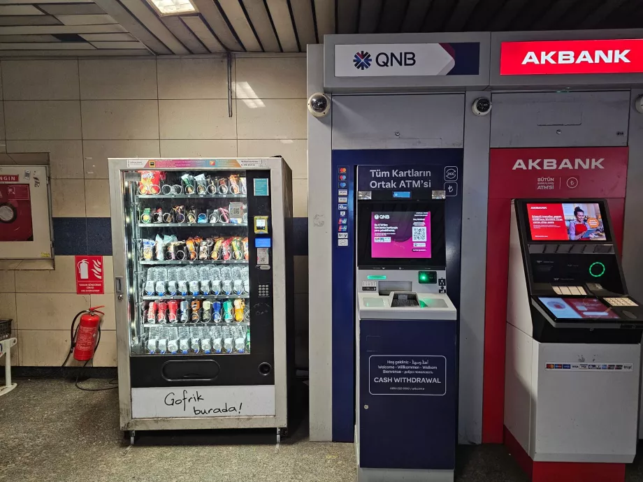 ATMs and vending machines with drinks and snacks in metro stations