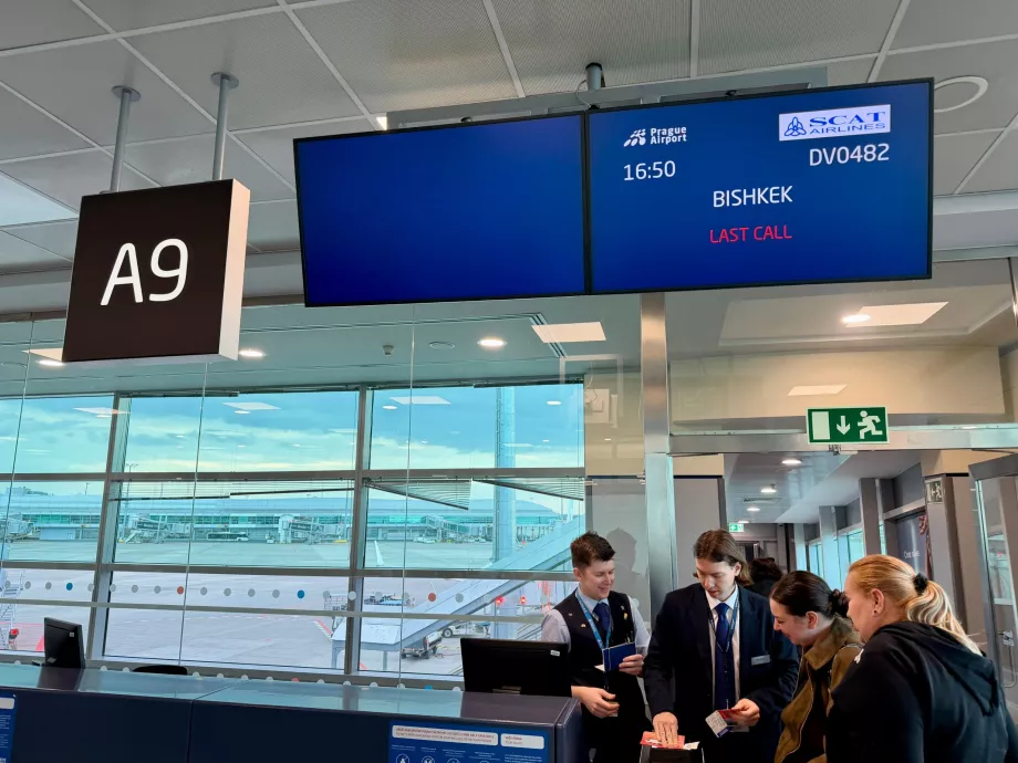 Boarding for flight to Sanya via Bishkek