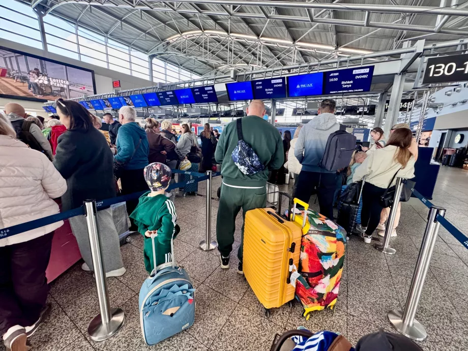 Check-in for PRG-SYX flight with SCAT