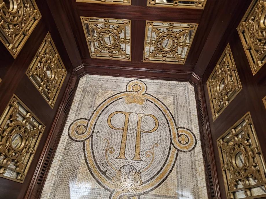 Plaza logo in the elevator