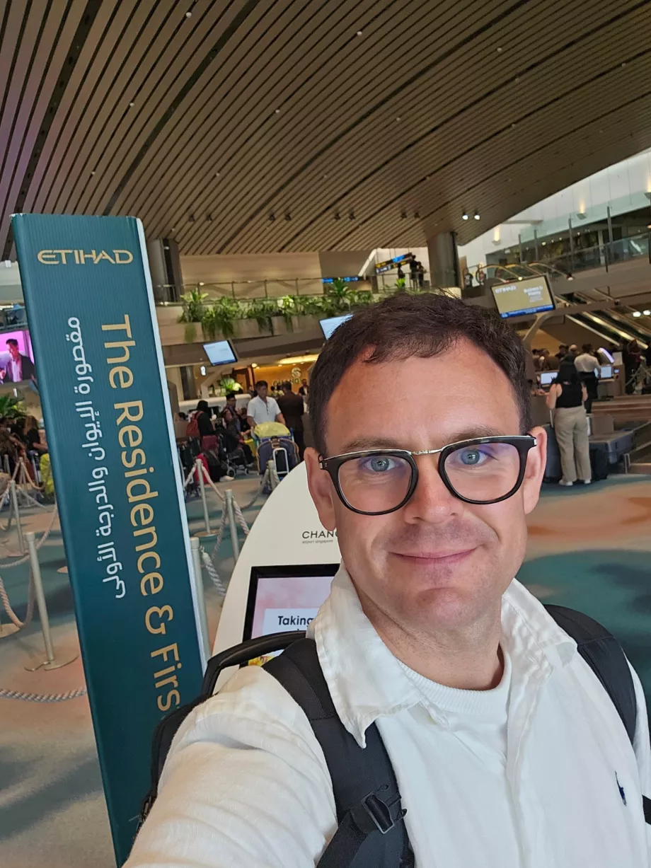 Me at check-in at Singapore Airport