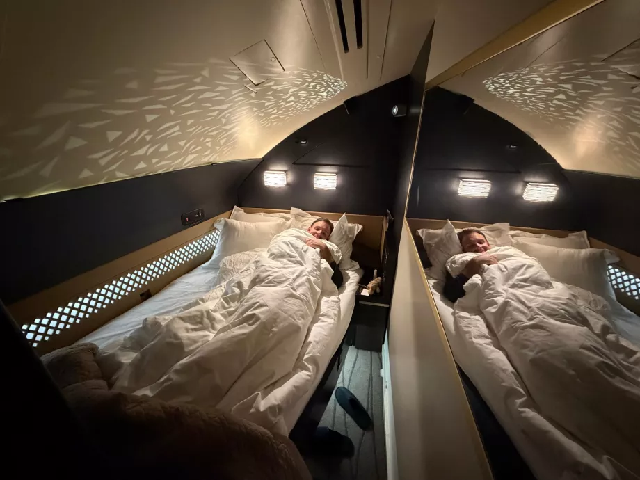 Me in bed during the flight
