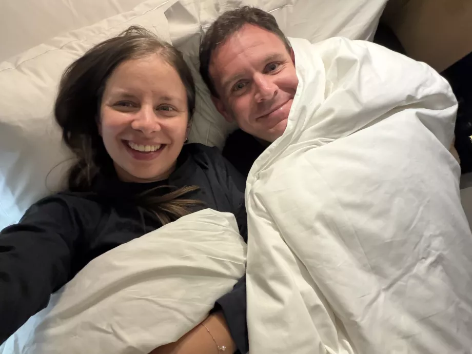 Us in bed during the flight
