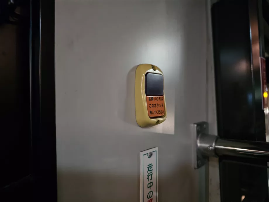 "STOP" button on city buses